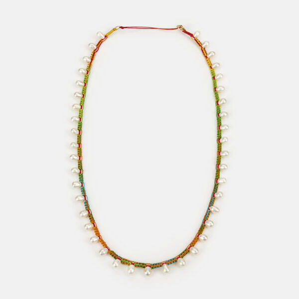 Embroidered moon gold colored "lucent" necklace with white freshwater drop pearls with rainbow cord
