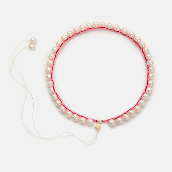 Embroidered large star gold colored "pulse" necklace with white freshwater pearls 8-8.5mm with red and pink cord