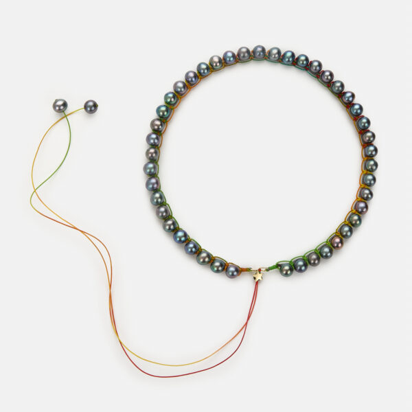 Embroidered star gold colored "echo" necklace with grey freshwater pearls 7-7.5mm with grey and rainbow cord
