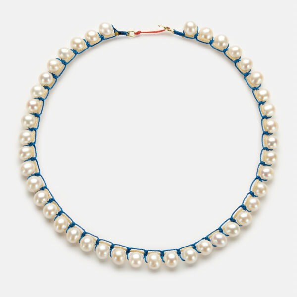 Embroidered moon gold colored "ocean" necklace with white freshwater pearls 8-8.5mm with ocean blue and coral cord
