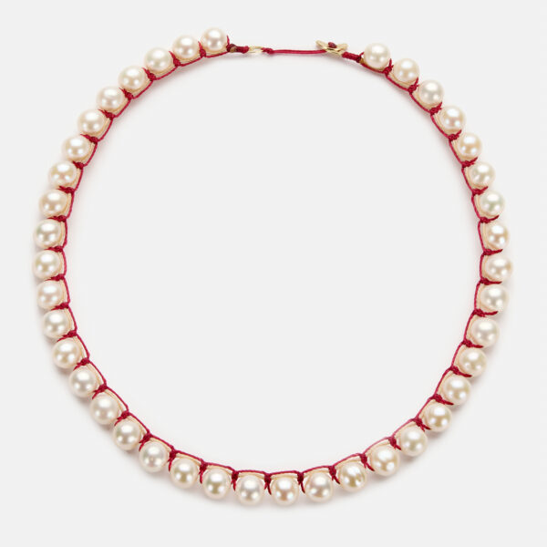 Embroidered moon gold colored "heartbeat" necklace with white freshwater pearls 8-8.5mm with beige and dark red cord