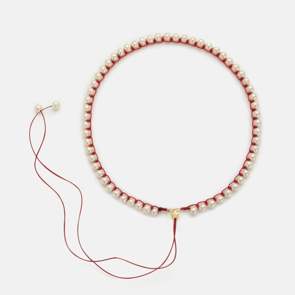 Embroidered star gold colored "heartbeat" necklace with white freshwater pearls 5.5-6mm with beige and dark red cord
