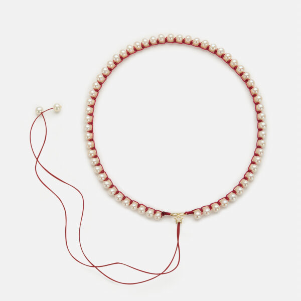 Embroidered superstar gold colored "heartbeat" necklace with white freshwater pearls 5.5-6mm with beige and dark red cord