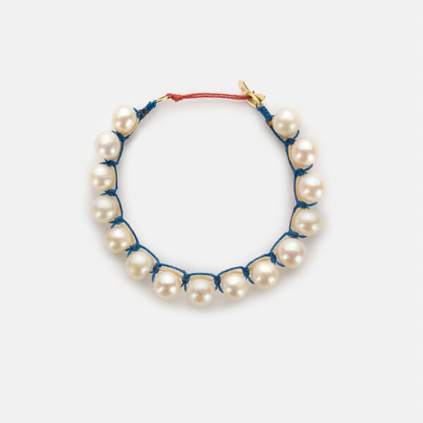 Embroidered moon gold colored "ocean" bracelet with white freshwater pearls 8-8.5mm with ocean blue cord