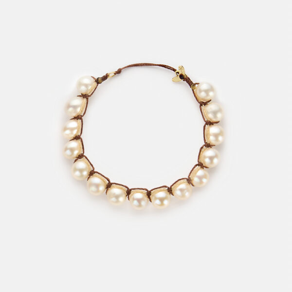 Embroidered moon gold colored "attraction" bracelet with white freshwater pearls 8-8.5mm with beige and brown cord