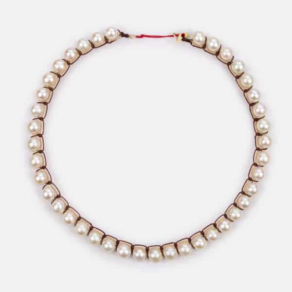 Embroidered moon gold colored "attraction" necklace with white freshwater pearls 8-8.5mm in beige and brown cord